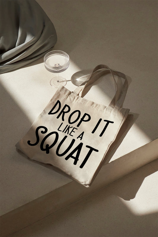 Drop it like a Squat Baumwolltasche Stoffbeutel Fitness Gym Bag Motiv Jutebeutel Spruch Tasche nachhaltig Schulterbeutel Einkaufstasche