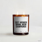 „2027: Weniger Drama, mehr Champagner“ – Duftkerze mit Spruch im Bernstein-Becherglas mit 2 Dochten