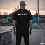 MADE IN HELL – schwarzes Oversize T-Shirt mit weißem Backprint, Herren im Skatepark