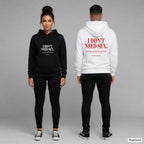 I Don’t Need Sex. Life Fucks Me Every Day – Hoodie unisex mit Frontprint (Frau, Schwarz) und Backprint (Mann, Weiß)
