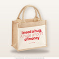 I need a hug. A huge amount of money – Jutetasche mit Spruch, kleine Jutetasche 26 × 22 cm