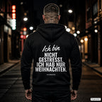 Ich bin nicht gestresst. Ich hab nur Weihnachten – schwarzer Hoodie mit weißem Backprint, Herren in der Stadt bei Nacht