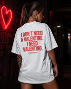 I DON’T NEED A VALENTINE. I NEED VALENTINO. | Oversize Shirt Unisex mit Statement Shirt Backprint aus Bio-Baumwolle