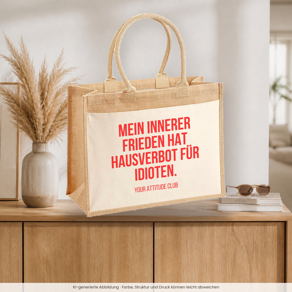 Mein innerer Frieden hat Hausverbot für Idioten. – Jutetasche mit Spruch, auf dem Sideboard im Flur