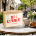 Null Kapazität. – Jutetasche mit Spruch, im Café