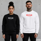 RED FLAG – Pullover mit Frontprint, Frau in Schwarz und Mann in Weiß vor Betonwand