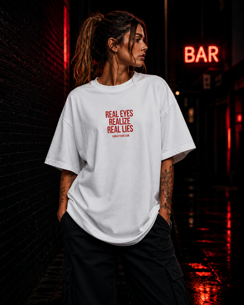 REAL EYES REALIZE REAL LIES | Oversize Shirt Unisex mit Frontprint, Statement Shirt aus Bio-Baumwolle