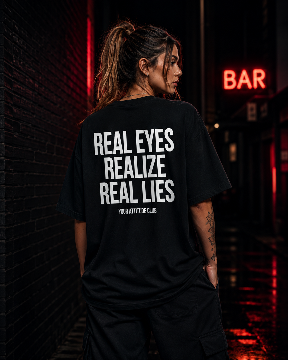 REAL EYES REALIZE REAL LIES | Oversize Shirt Unisex mit Backprint, Statement Shirt aus Bio-Baumwolle