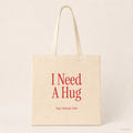 I Need A Hug – Stoffbeutel mit Spruch natur mit rotem Aufdruck, Produktansicht