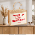 Wake Up Barbie, Ken Is Gay – Jutetasche mit Spruch, auf dem Sideboard im Flur