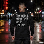 Christkind, bring Geld. Keine Gefühle – schwarzer Weihnachtspullover mit weißem Backprint, Herren in der Stadt bei Nacht