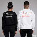 Mein Weihnachtswunsch liegt nicht unterm Baum. Sondern im Bett – Weihnachtspullover mit Backprint, Frau in Schwarz und Mann in Weiß