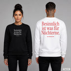 Besinnlich ist was für Nüchterne – Weihnachtspullover unisex mit Frontprint (Frau, Schwarz) und Backprint (Mann, Weiß)