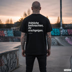 Fröhliche Weihnachten, ihr Arschgeigen. – schwarzes Oversize T-Shirt mit weißem Backprint, Herren