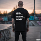 Ich bin der Grund, warum es eine Naughty List gibt. – schwarzes Oversize T-Shirt mit weißem Backprint, Herren