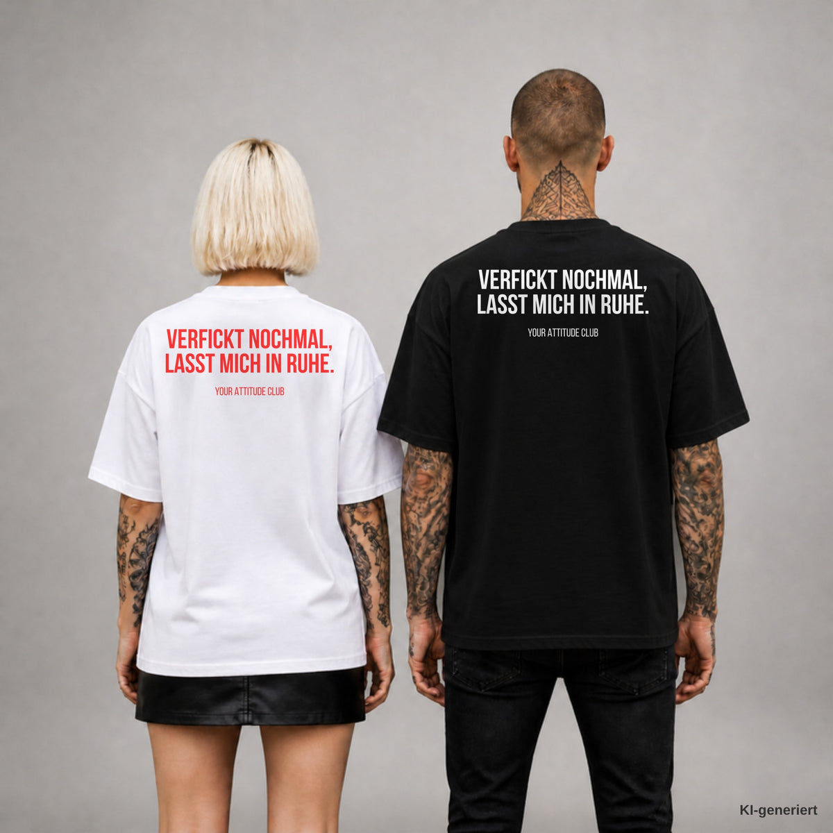 VERFICKT NOCHMAL, LASST MICH IN RUHE. – Oversize T-Shirt Unisex mit Backprint, Frau in Weiß mit rotem und Mann in Schwarz mit weißem Aufdruck
