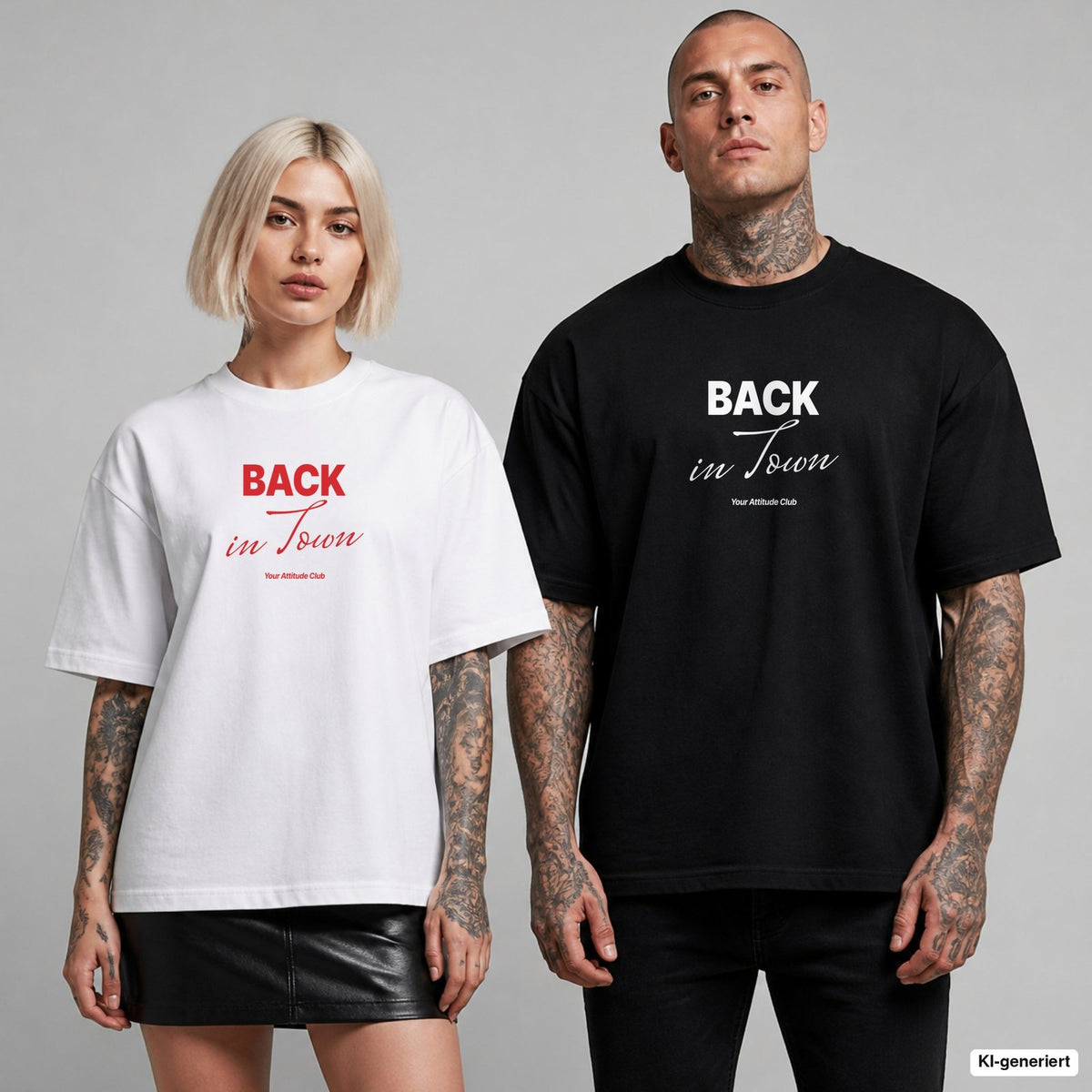 BACK IN TOWN – Oversize T-Shirt mit Frontprint, Frau in Weiß mit rotem und Mann in Schwarz mit weißem Aufdruck