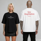 SEXY IMAGINATION – Oversize T-Shirt mit Frontprint (Frau, Schwarz) und Backprint (Mann, Weiß)