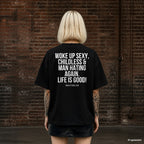 WOKE UP SEXY, CHILDLESS & MAN HATING AGAIN. LIFE IS GOOD! – schwarzes Oversize T-Shirt mit weißem Backprint, Damen